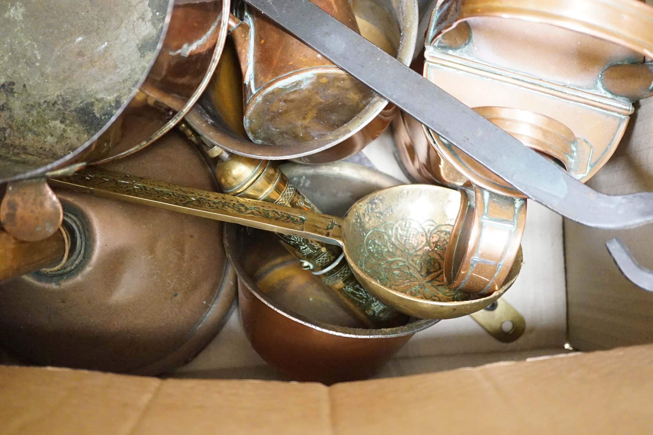 A quantity of various copper and brass to include jelly moulds, trivets, watering cans etc.